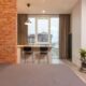 loft style room with brick walls and window view in Upland, CA