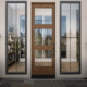 Modern front entry with tall replacement windows and glass door in Corona, CA