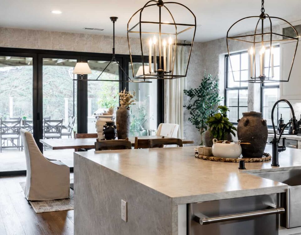 Modern kitchen interior with large glass sliding doors enhancing natural light for Ontario, CA window replacement