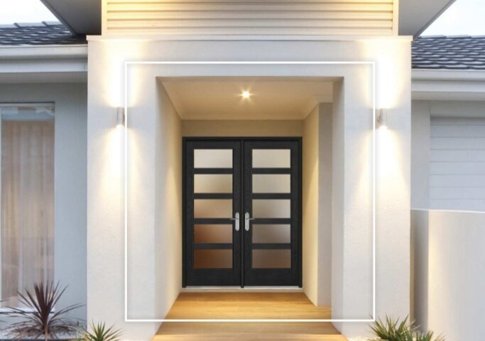 Modern front entry with black double doors highlighting Ontario, CA windows and exterior design