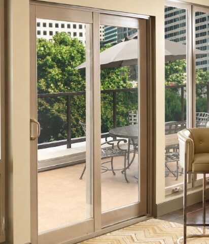 Sliding replacement patio door with large glass panels opening to a balcony in Upland, CA