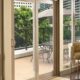 Sliding replacement patio door with large glass panels opening to a balcony in Upland, CA