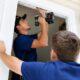Professional installers completing a Corona, CA window replacement at a residential home