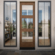 Modern entry door framed by replacement windows in Upland, CA